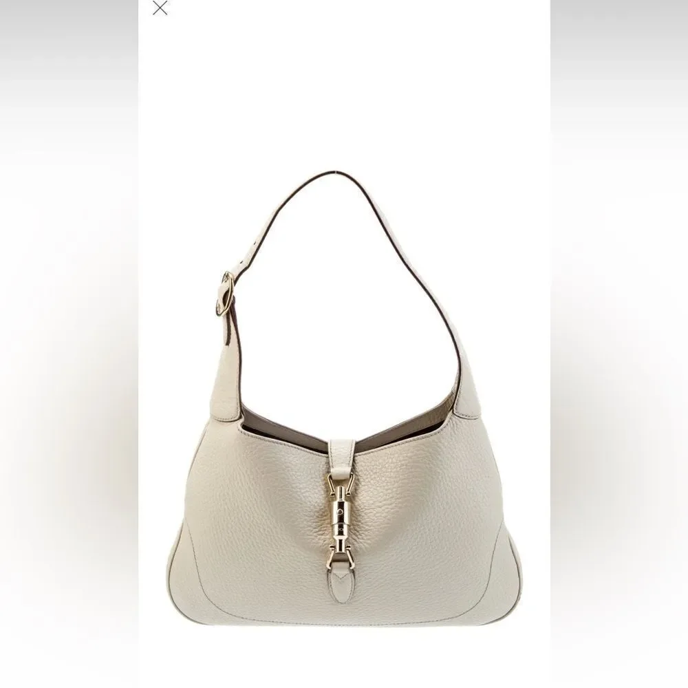 Gucci beiges leather Jackie bag with silver piston lock